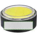at the side